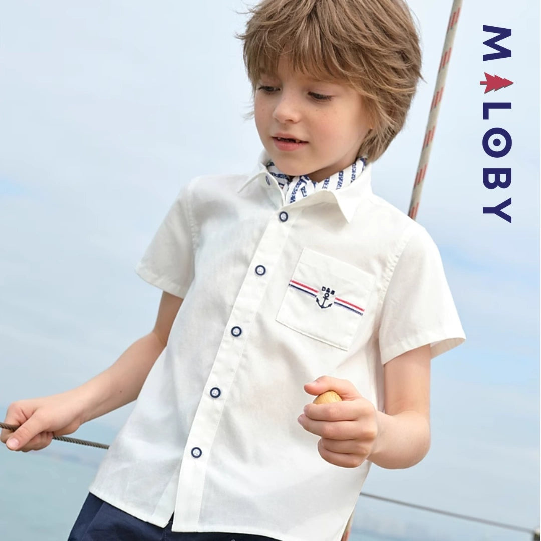 Chemise blanche motifs marins pour garçon, parfaite pour les fêtes et occasions spéciales.