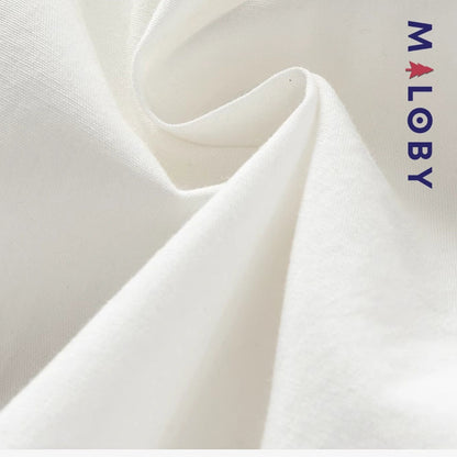Chemise blanche motifs marins pour garçon, parfaite pour les fêtes et occasions spéciales.