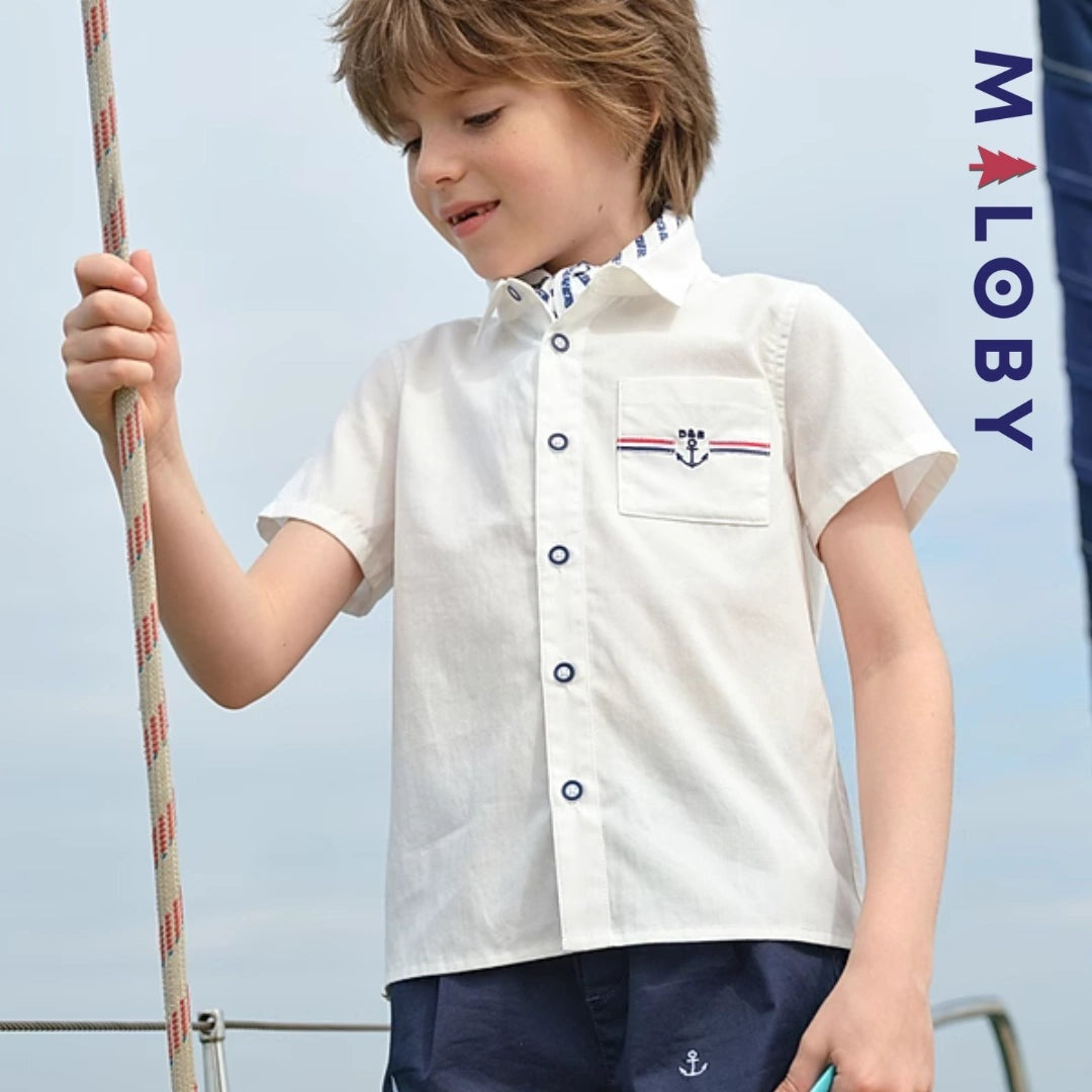 Chemise blanche motifs marins pour garçon, parfaite pour les fêtes et occasions spéciales.