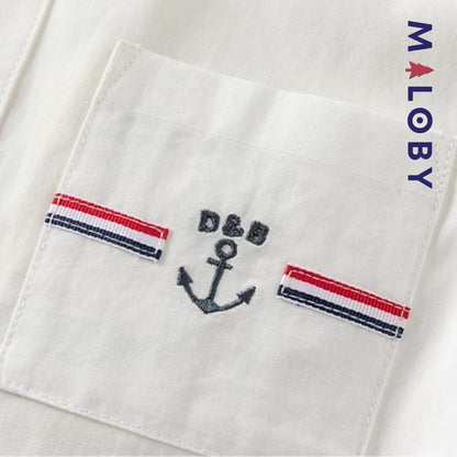 Chemise blanche motifs marins pour garçon, parfaite pour les fêtes et occasions spéciales.