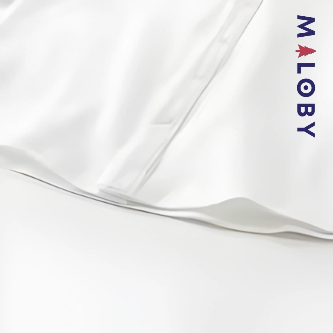 Chemise blanche à nœud papillon pour garçon, parfaite pour les anniversaires et occasions spéciales.