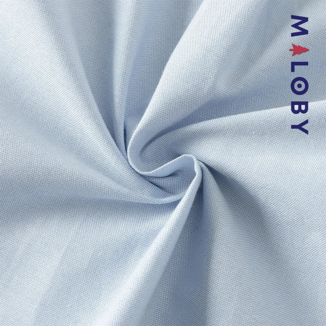 Chemise en pur coton bleu ciel pour garçon, idéale pour les anniversaires et les occasions spéciales.