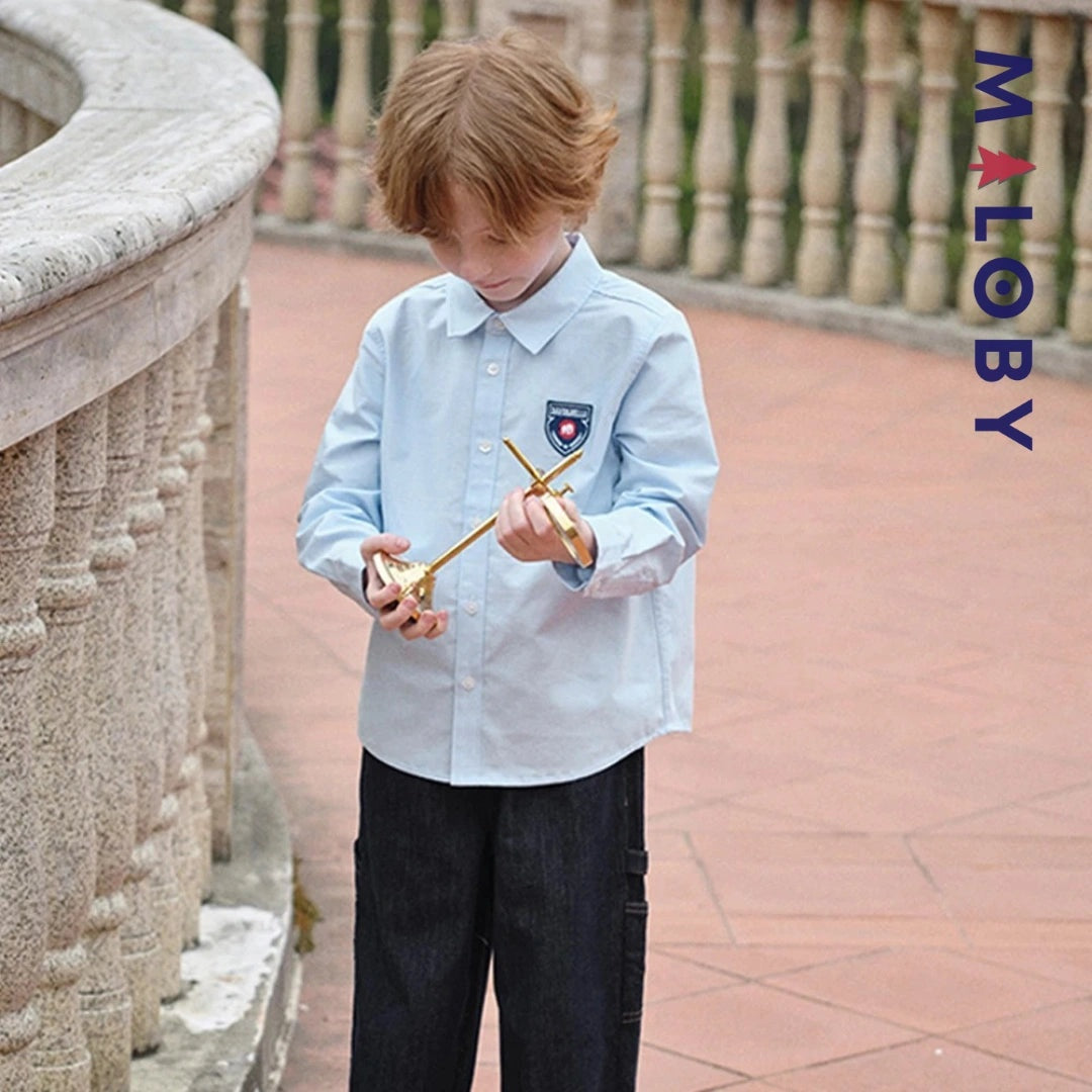 Chemise en pur coton bleu ciel pour garçon, idéale pour les anniversaires et les occasions spéciales.