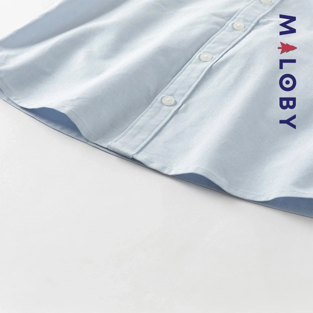 Chemise en pur coton bleu ciel pour garçon, idéale pour les anniversaires et les occasions spéciales.