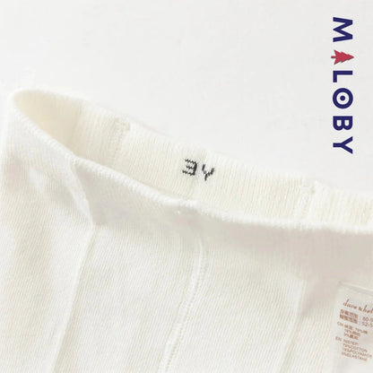 Collant épais fantaisie beige pour petite fille, idéal pour les vêtements enfants.