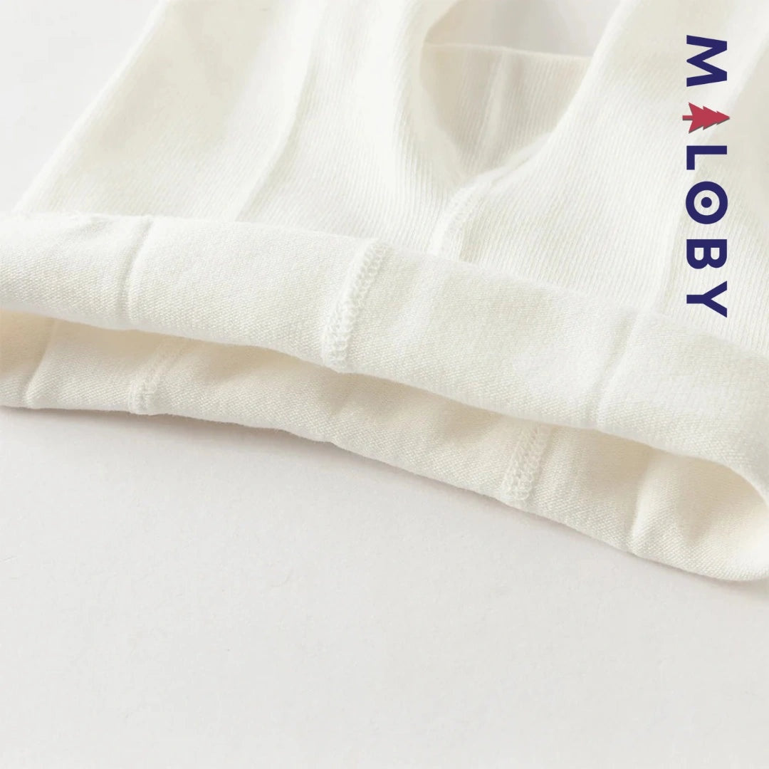 Collant épais fantaisie beige pour petite fille, idéal pour les vêtements enfants.