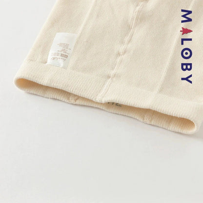 Collant épais beige fleurette pour filles, parfait pour les vêtements d'enfants au Maroc.