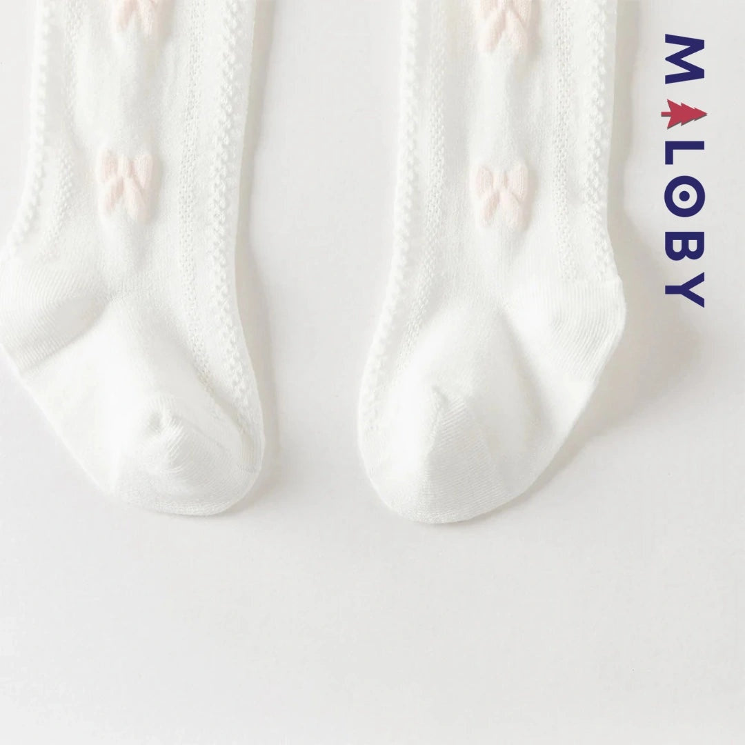 Collant épais motif nœud fantaisie pour fille, idéal pour les vêtements d'enfants au Maroc.