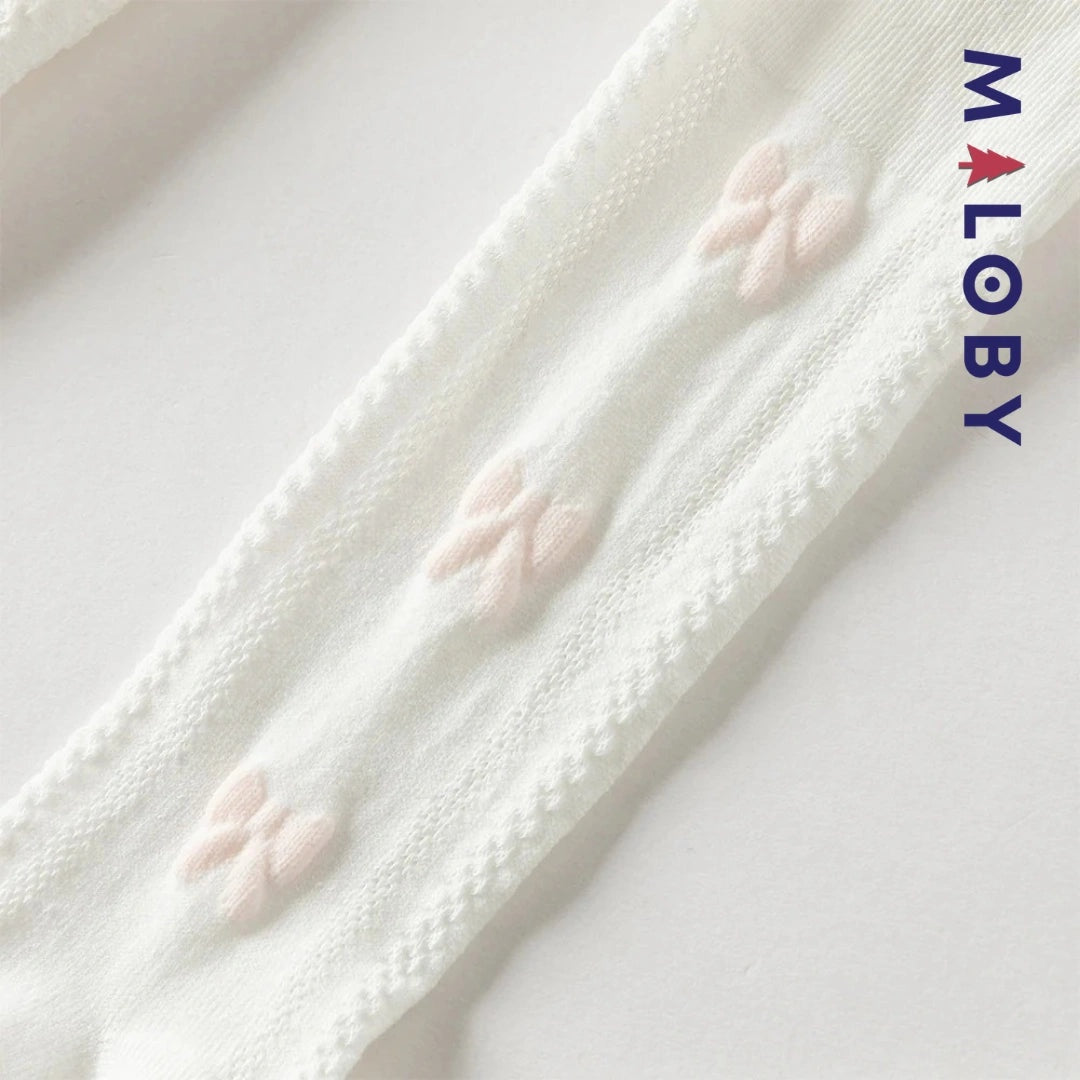 Collant épais motif nœud fantaisie pour fille, idéal pour les vêtements d'enfants au Maroc.