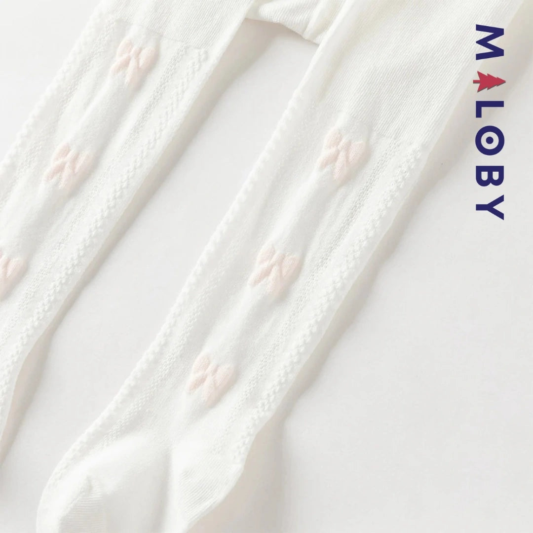 Collant épais motif nœud fantaisie pour fille, idéal pour les vêtements d'enfants au Maroc.