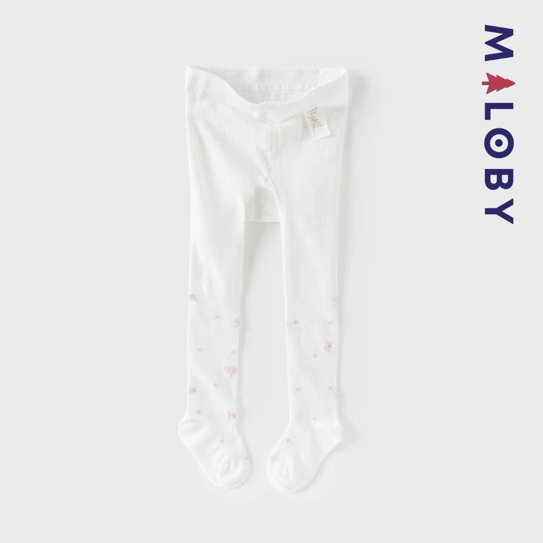 Collant épais rose à motifs pour fille, parfait pour les vêtements d'enfants.