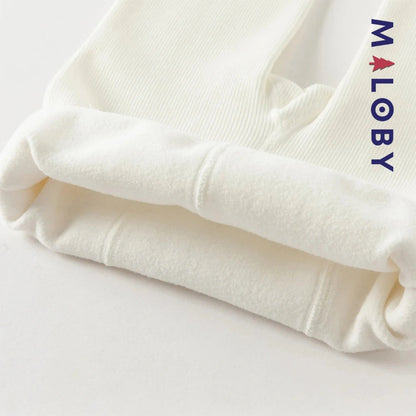Collant épais beige et noir avec nœuds pour fille, parfait pour enfants et anniversaires.
