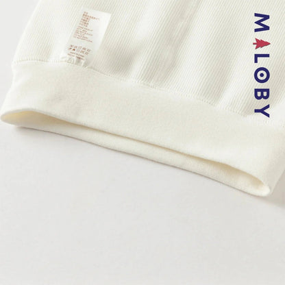 Collant épais beige et noir avec nœuds pour fille, parfait pour enfants et anniversaires.