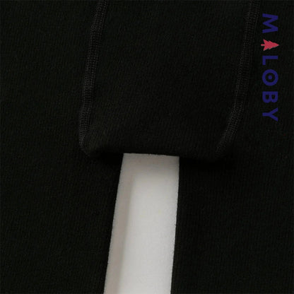 Collant épais beige et noir avec nœuds pour fille, parfait pour enfants et anniversaires.