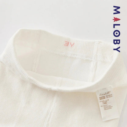 Collants épais à pois et nœud fantaisie pour fille en beige, parfaits pour les vêtements d'enfants.