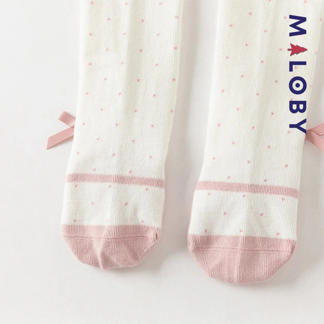 Collants épais à pois et nœud fantaisie pour fille en beige, parfaits pour les vêtements d'enfants.