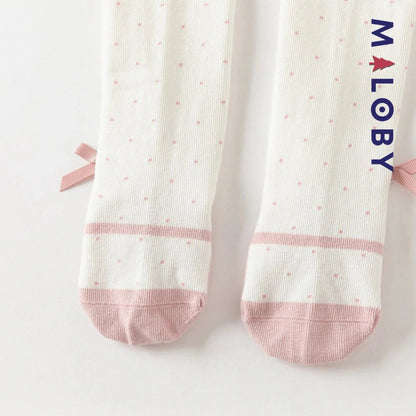 Collants épais à pois et nœud fantaisie pour fille en beige, parfaits pour les vêtements d'enfants.