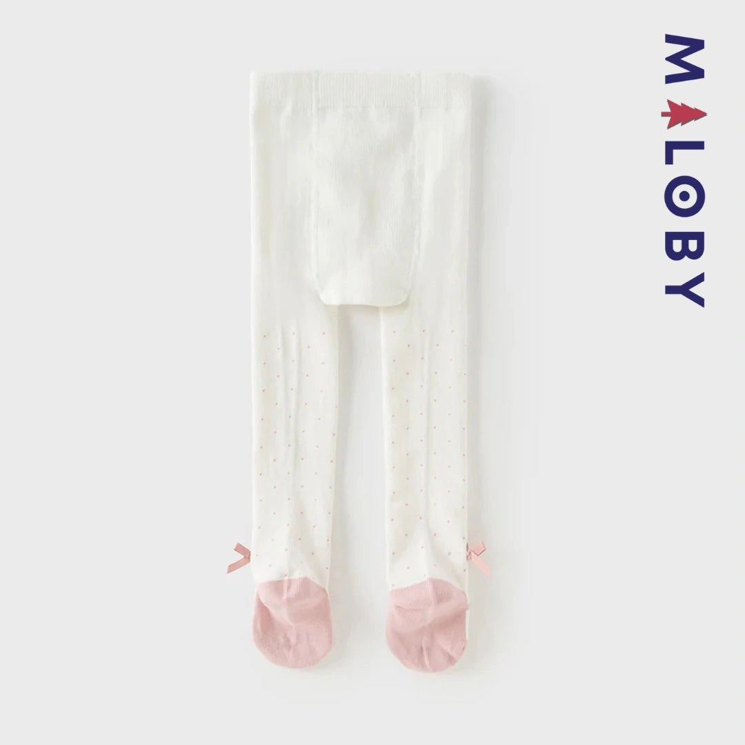 Collants épais à pois et nœud fantaisie pour fille en beige, parfaits pour les vêtements d'enfants.
