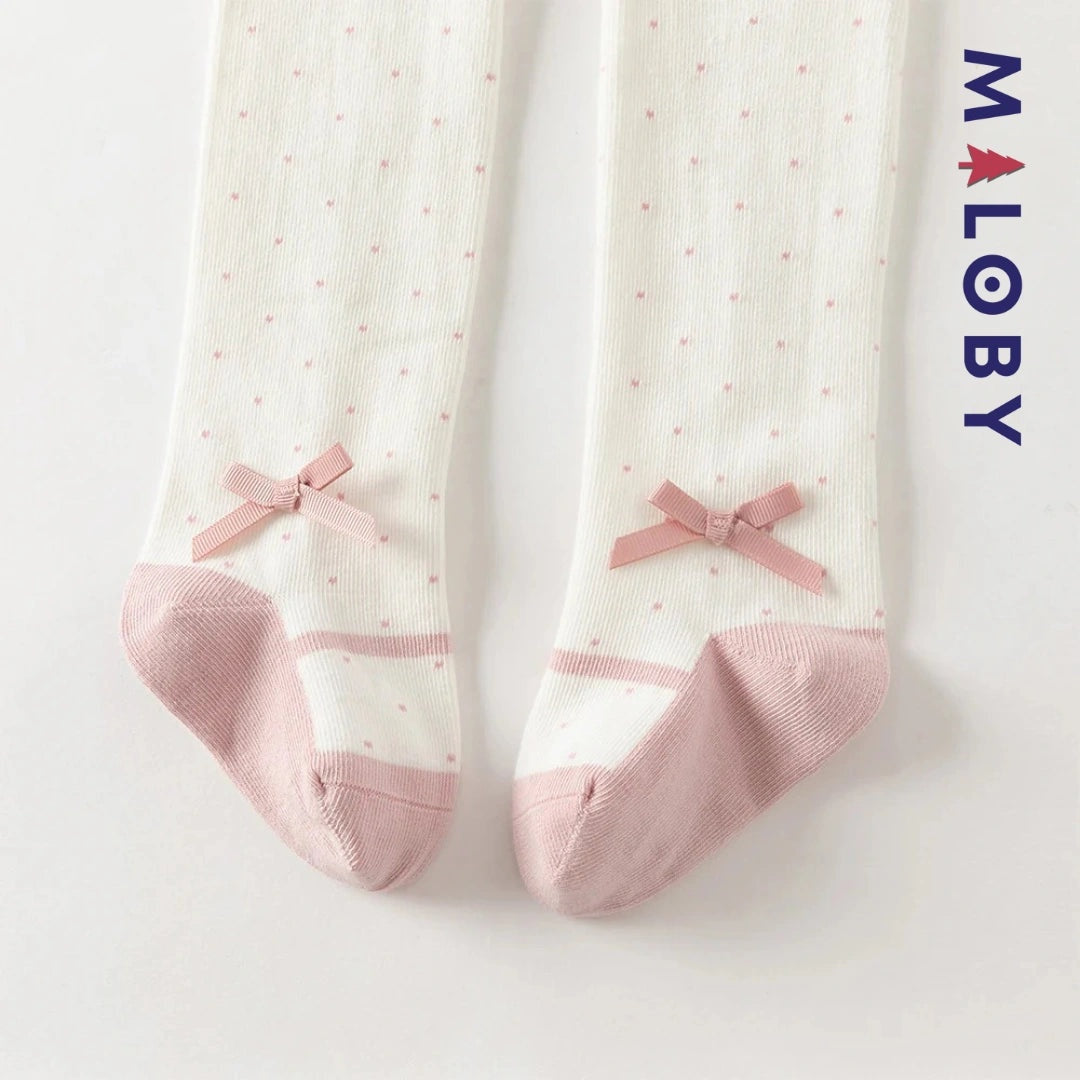 Collants épais à pois et nœud fantaisie pour fille en beige, parfaits pour les vêtements d'enfants.