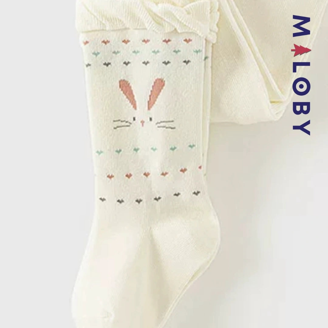 Collant fantaisie beige pour fille, parfait pour les vêtements d'enfants et les anniversaires.