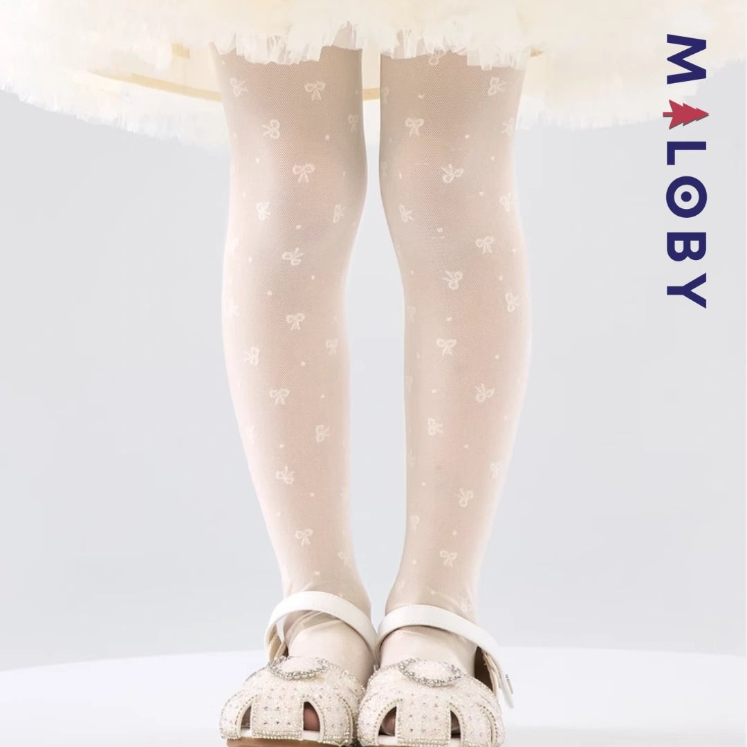 Collants fins unis beige pour fille, idéal pour vêtements enfants et anniversaires.