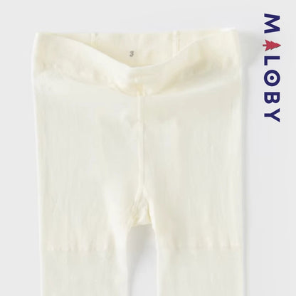 Collants fins unis beige pour fille, idéal pour vêtements enfants et anniversaires.
