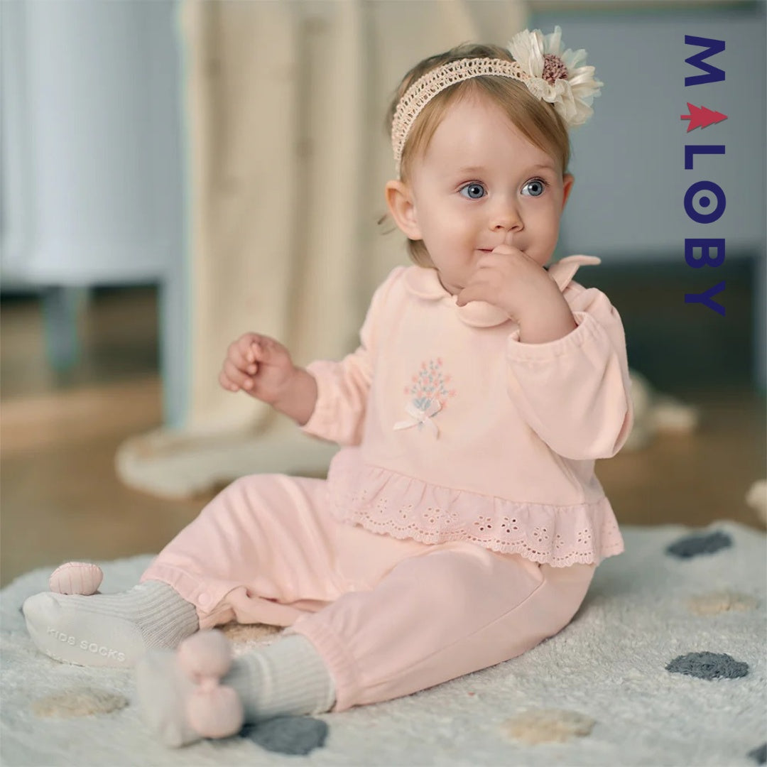 Combinaison antibactérienne rose pour bébé fille, idéale pour les vêtements enfants et les occasions spéciales.