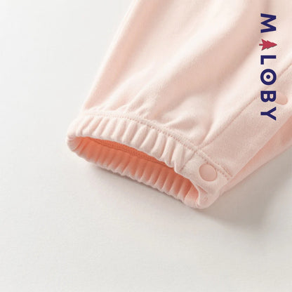 Combinaison antibactérienne rose pour bébé fille, idéale pour les vêtements enfants et les occasions spéciales.