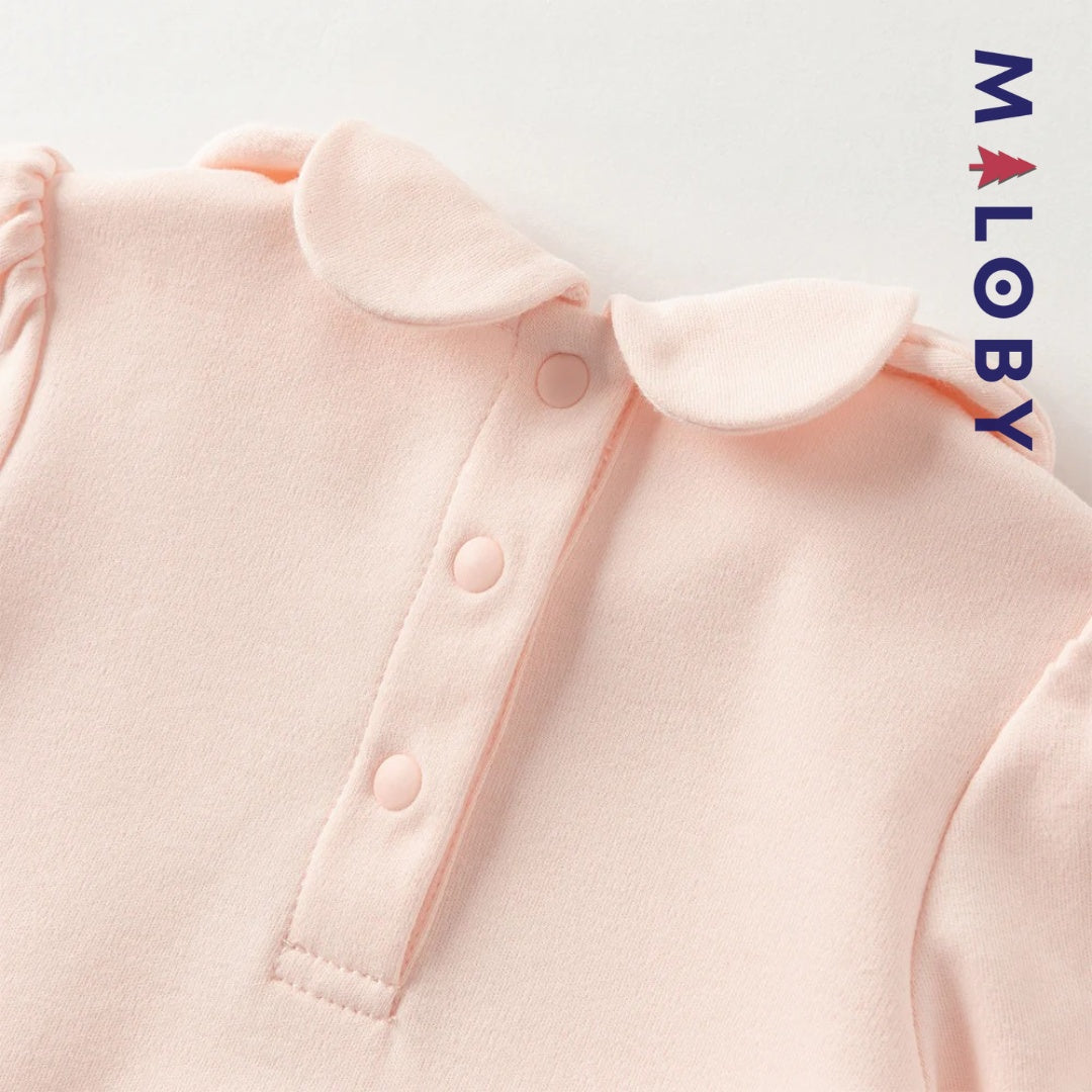 Combinaison antibactérienne rose pour bébé fille, idéale pour les vêtements enfants et les occasions spéciales.
