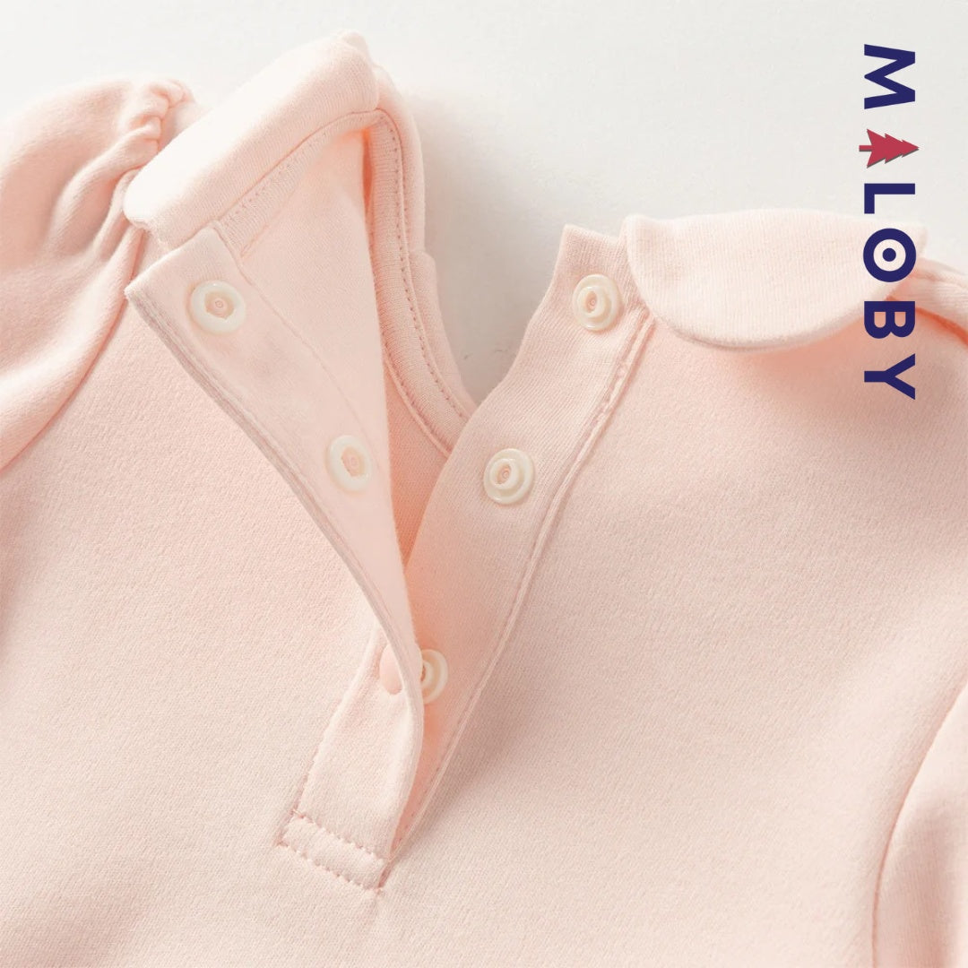 Combinaison antibactérienne rose pour bébé fille, idéale pour les vêtements enfants et les occasions spéciales.