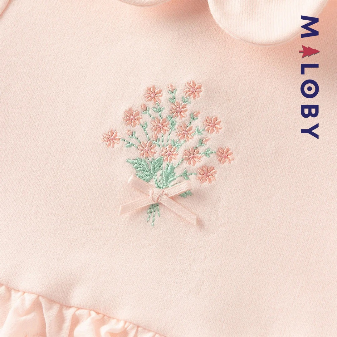 Combinaison antibactérienne rose pour bébé fille, idéale pour les vêtements enfants et les occasions spéciales.
