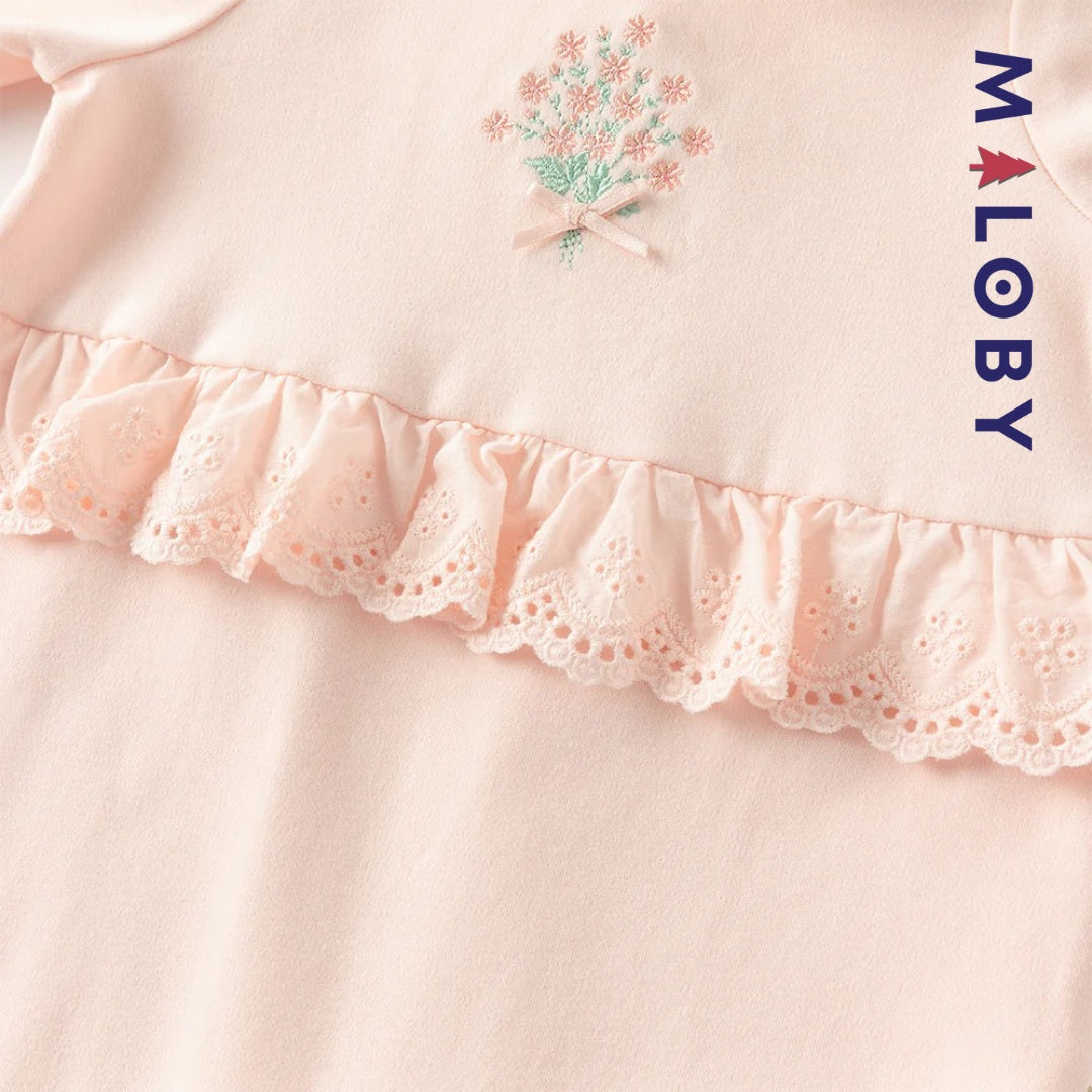 Combinaison antibactérienne rose pour bébé fille, idéale pour les vêtements enfants et les occasions spéciales.