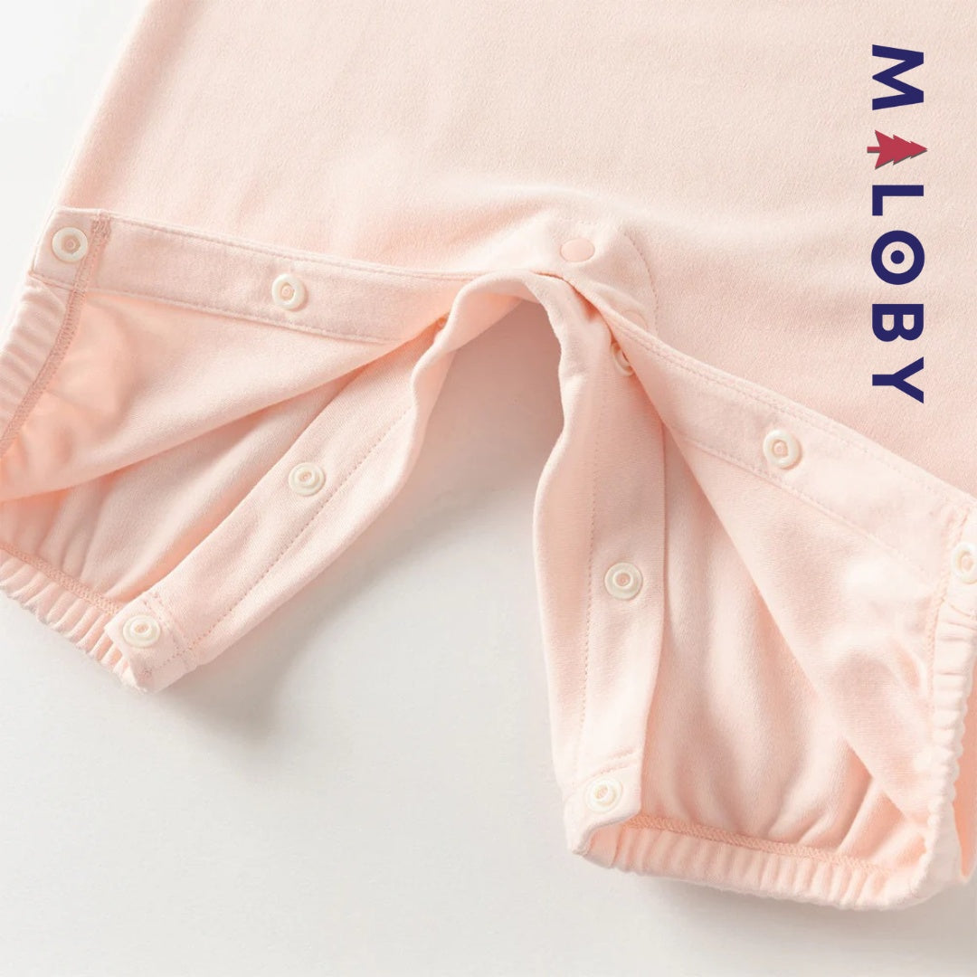 Combinaison antibactérienne rose pour bébé fille, idéale pour les vêtements enfants et les occasions spéciales.