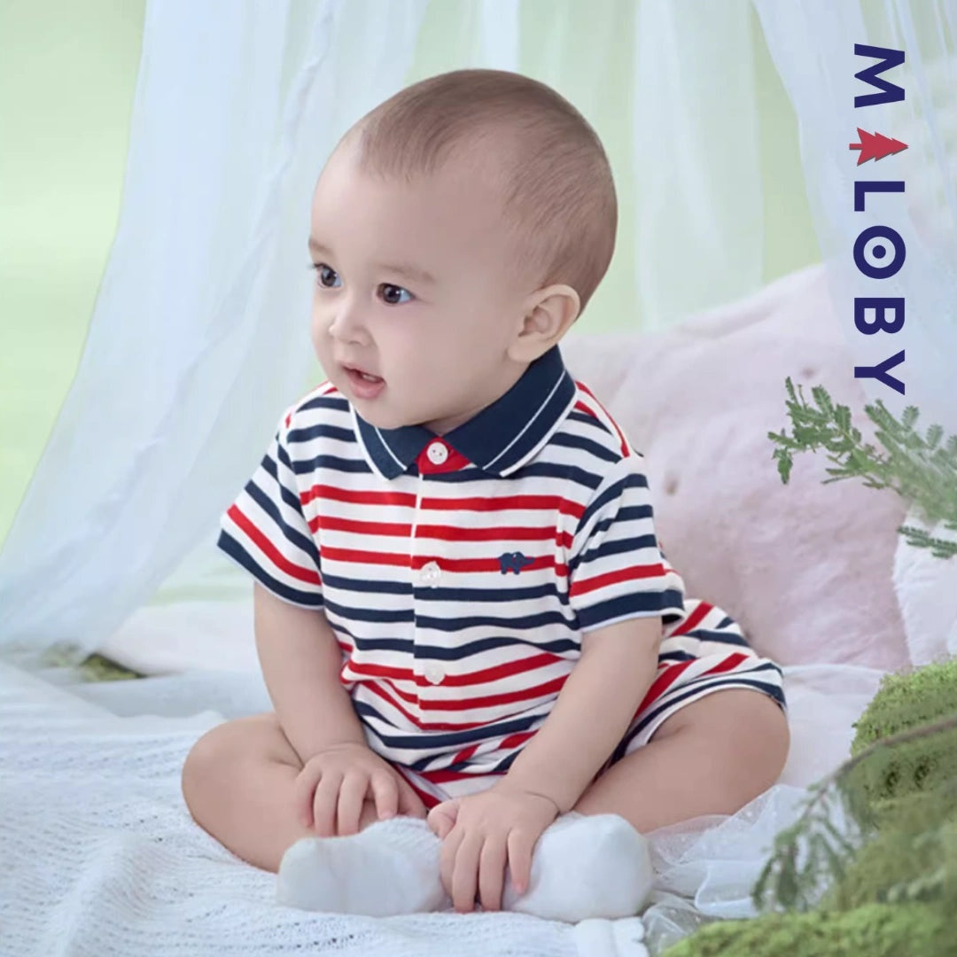Combinaison bébé garçon rouge rayé, idéale pour anniversaires et événements spéciaux.