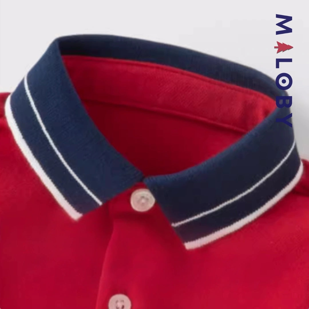 Combinaison bébé garçon rouge rayé, idéale pour anniversaires et événements spéciaux.