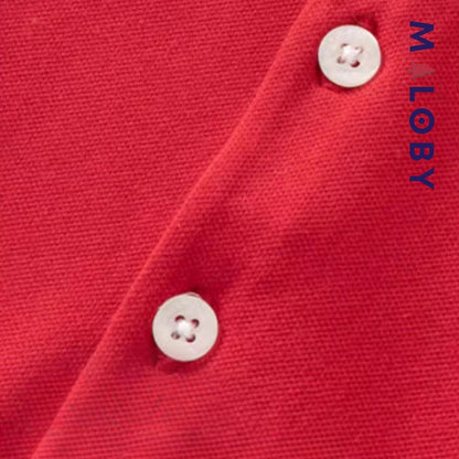 Combinaison bébé garçon rouge rayé, idéale pour anniversaires et événements spéciaux.