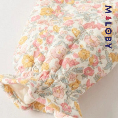 Combinaison habillée motif floral pour bébé fille en rose, idéale pour les anniversaires.