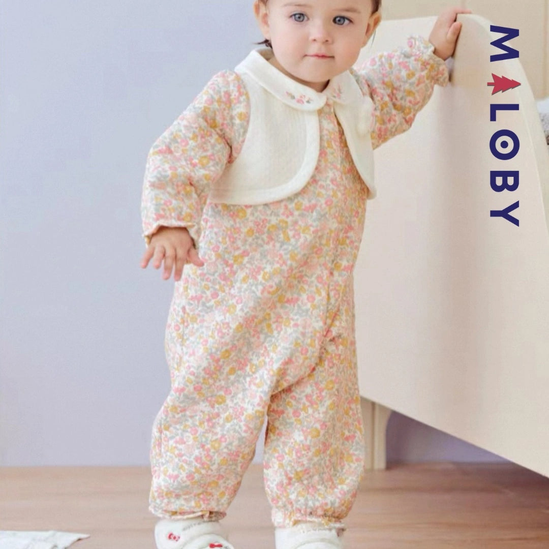 Combinaison habillée motif floral pour bébé fille en rose, idéale pour les anniversaires.