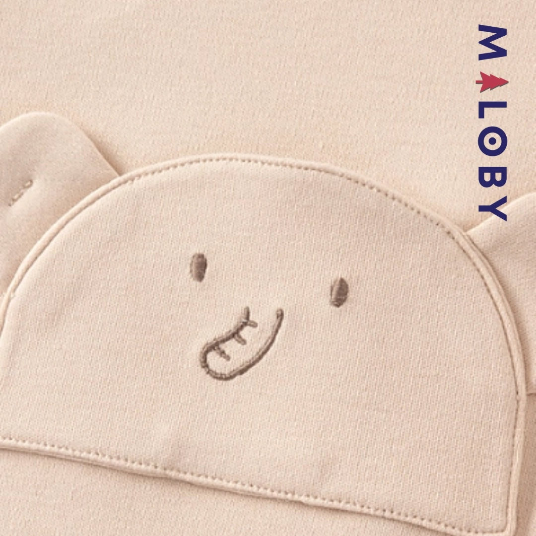 Combinaison longue beige à motif éléphant pour garçon, idéale pour les vêtements d'anniversaire des enfants.