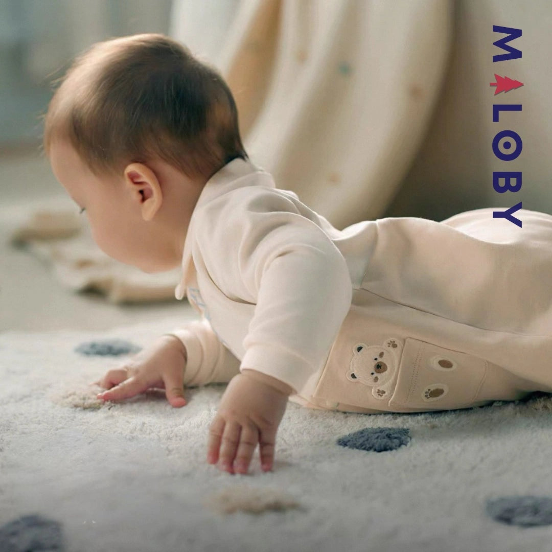 Combinaison longue fantaisie beige pour bébé garçon, élégante et confortable.