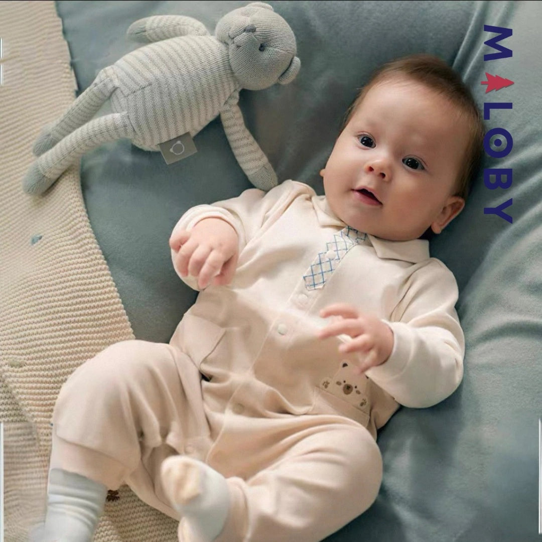 Combinaison longue fantaisie beige pour bébé garçon, élégante et confortable.