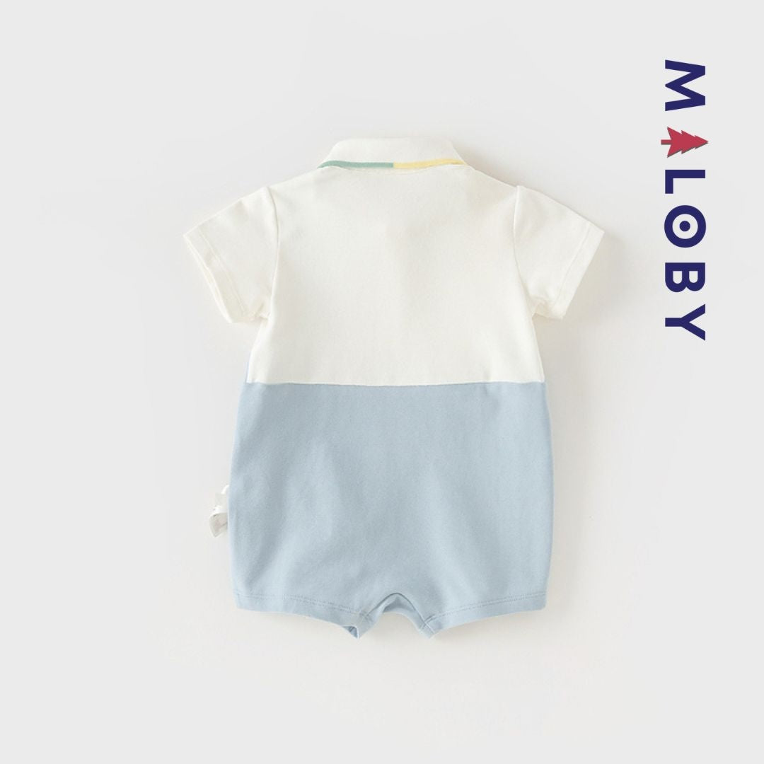 Combishort bébé garçon en piqué de coton blanc, parfait pour les occasions spéciales.