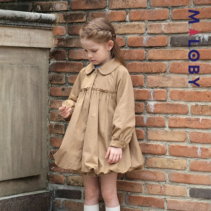 Coupe-vent mi-long beige pour fille, idéal pour les vêtements enfants au Maroc.