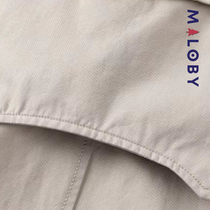 Trench uni beige pour fille, idéal pour les vêtements enfants et les anniversaires.