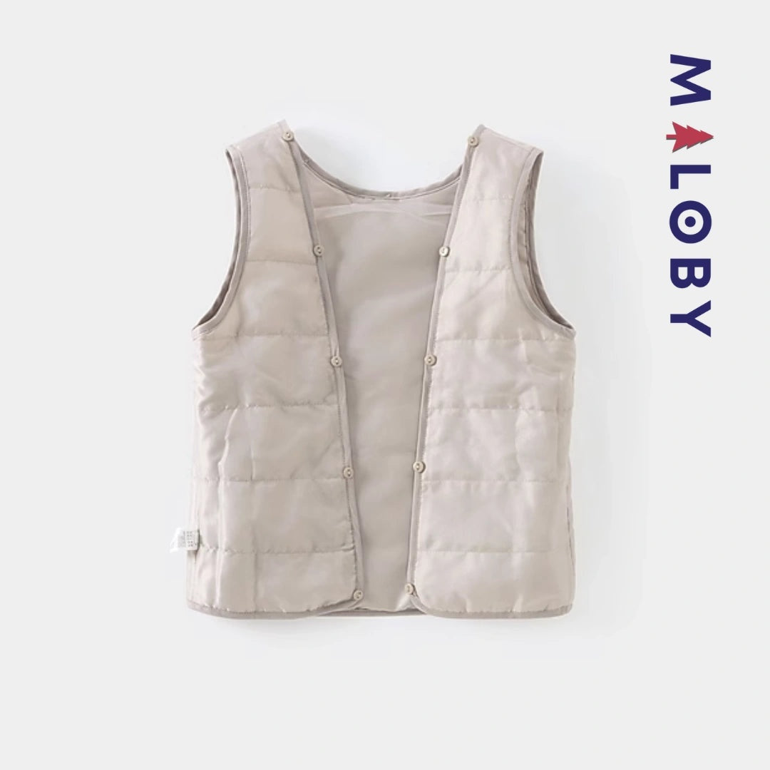 Trench uni beige pour fille, idéal pour les vêtements enfants et les anniversaires.