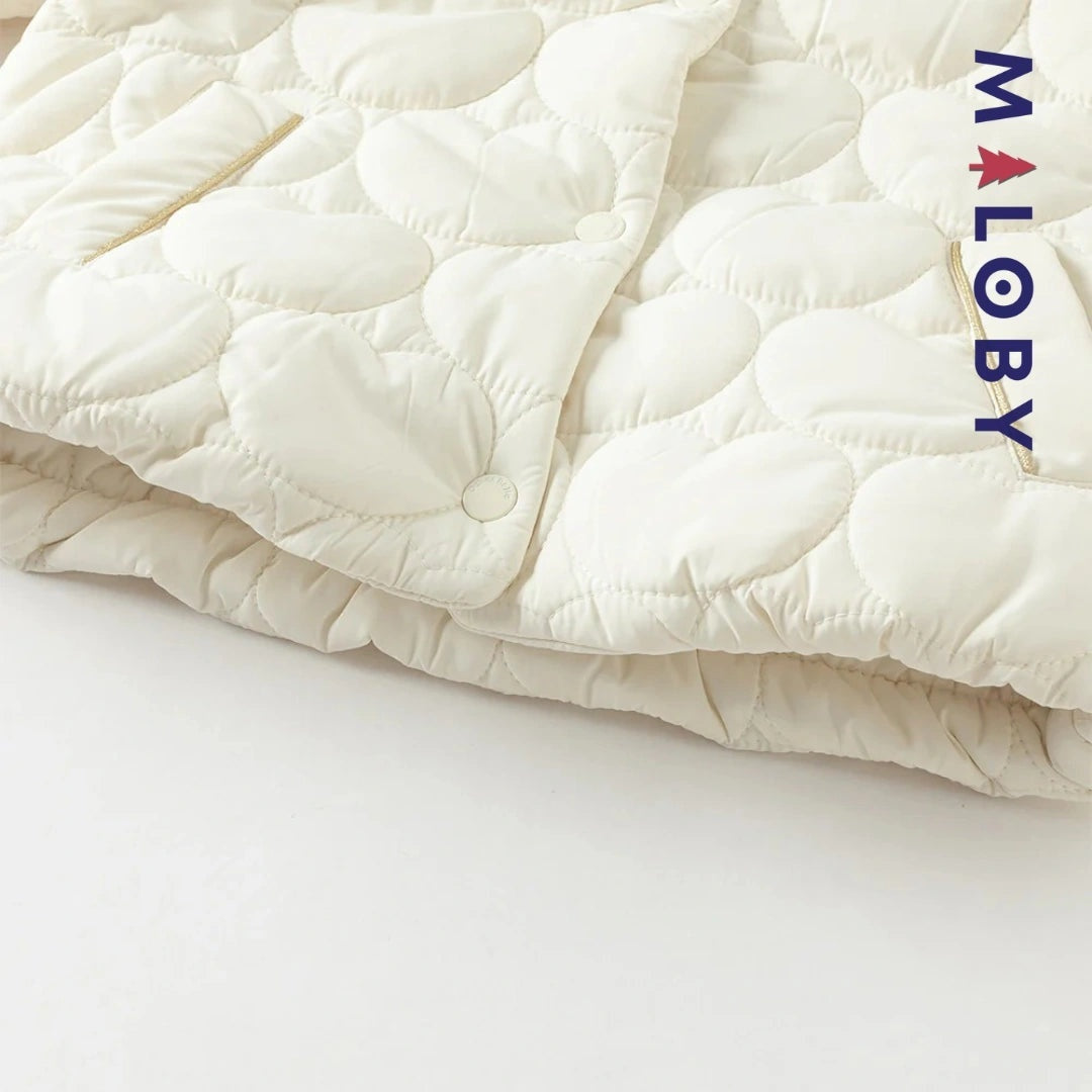 Veste courte matelassée beige pour fille, idéale pour enfants sensibles