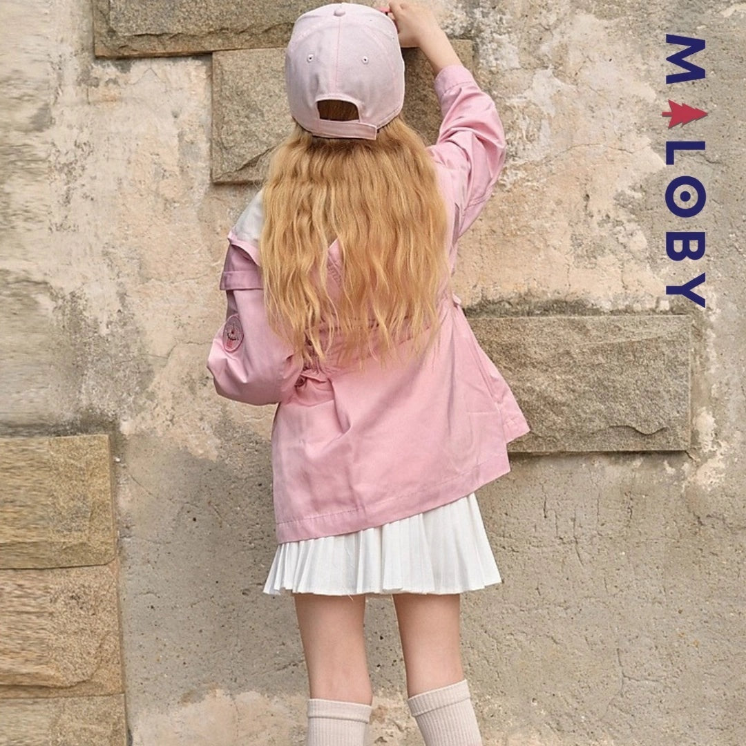 Veste imperméable rose pour enfant fille, idéale pour la mi-saison et les activités en extérieur.