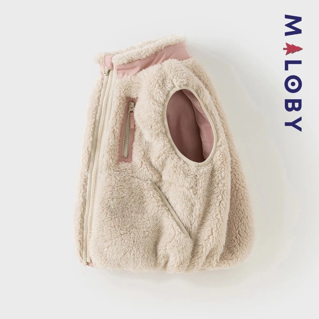 Veste sans manches en peluche rose pour fille, idéale pour les vêtements enfants et anti-allergiques.