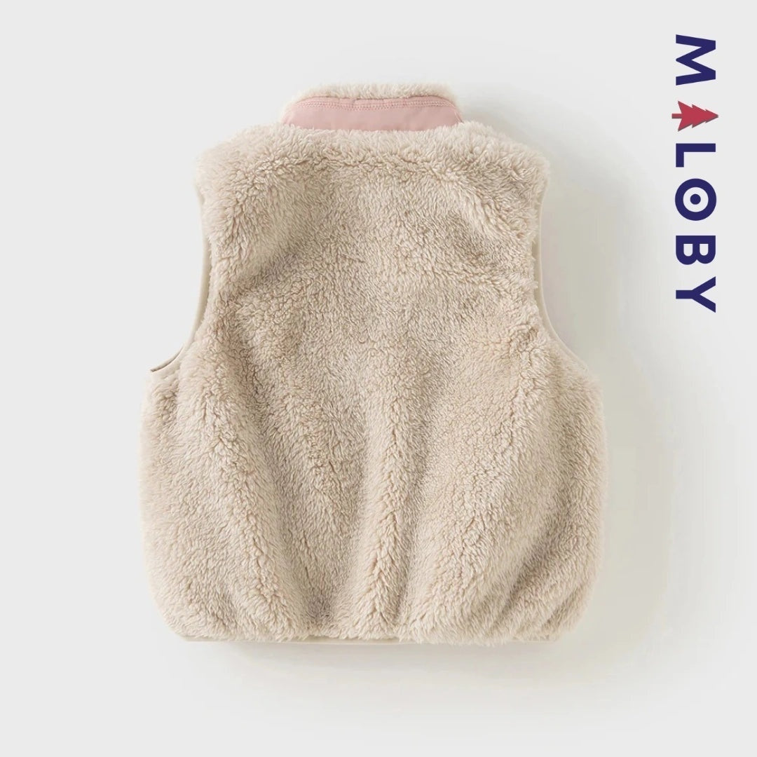 Veste sans manches en peluche rose pour fille, idéale pour les vêtements enfants et anti-allergiques.