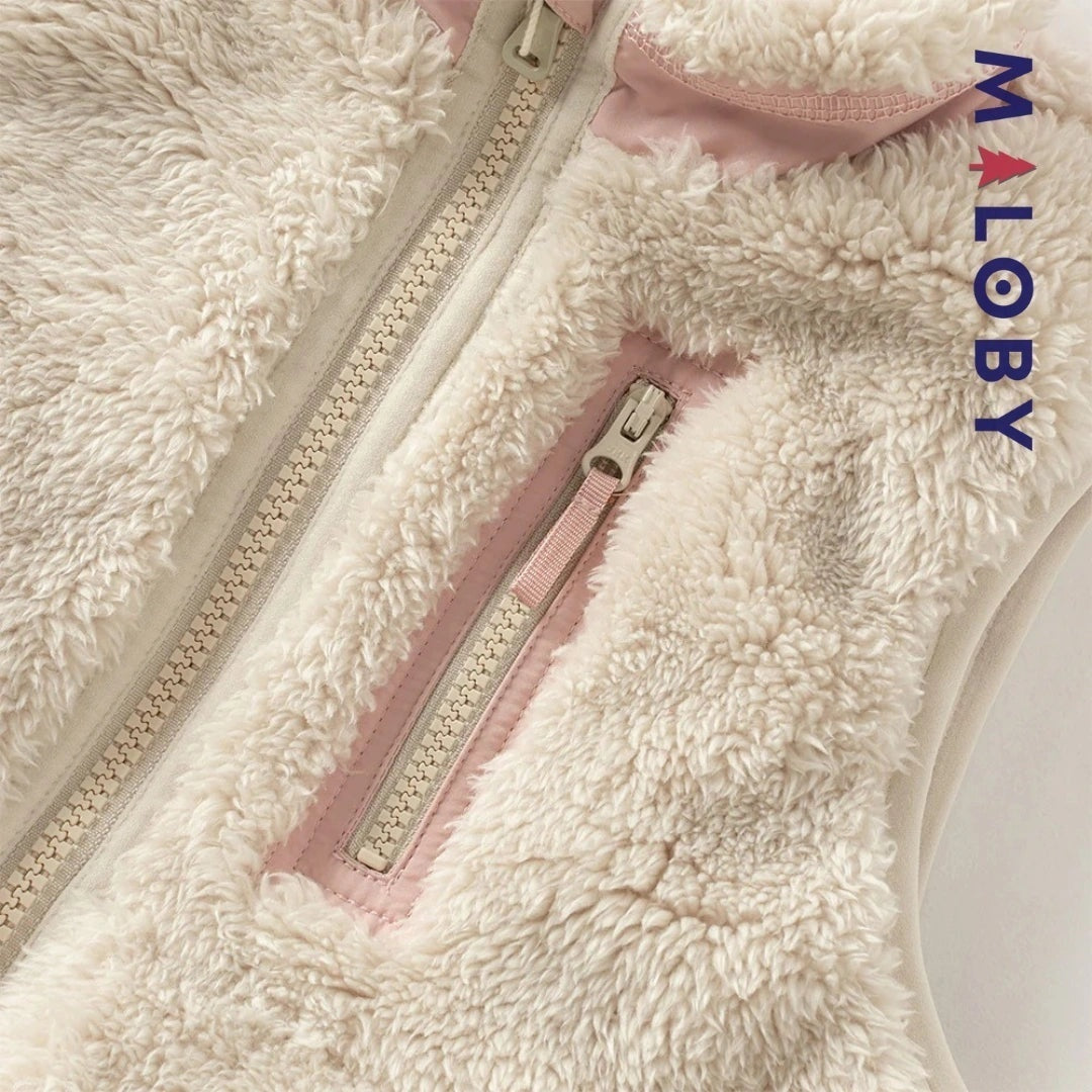 Veste sans manches en peluche rose pour fille, idéale pour les vêtements enfants et anti-allergiques.